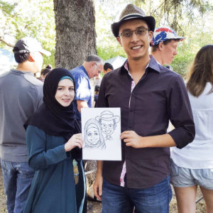 funny portrait of a couple at outdoor event