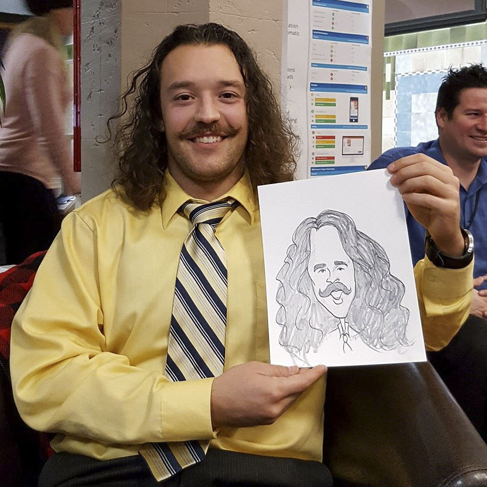 long haired man with caricature art