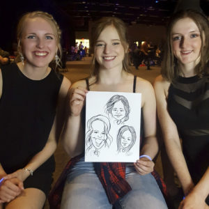 Grade 12 Graduates with their hand-drawn caricature art
