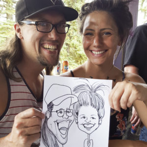caricature of couple at outdoor event