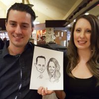 Wedding reception caricatures with couple